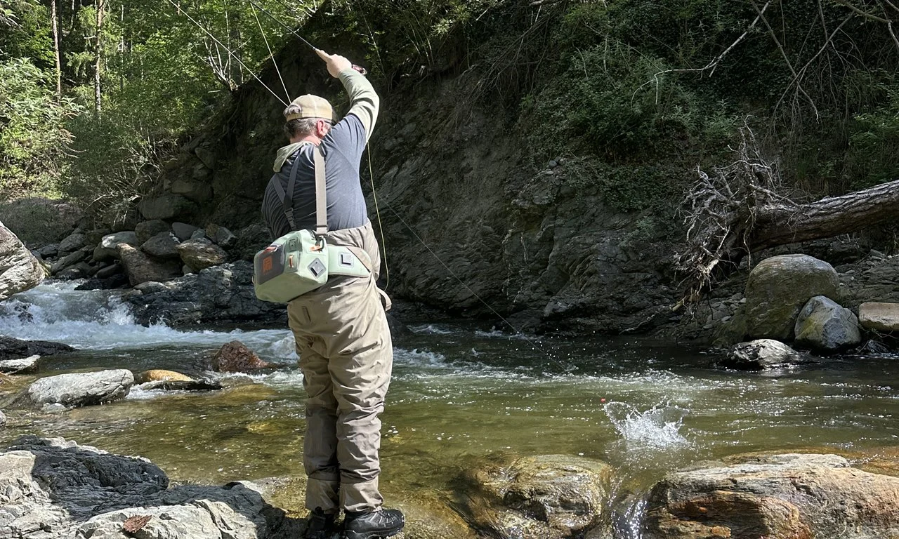 Fly fishing for wild Brown Trout in the Tinne Stream, near Chiusa in the Italian Dolomites.